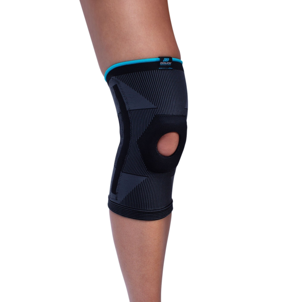 knee stabilizing brace black standing